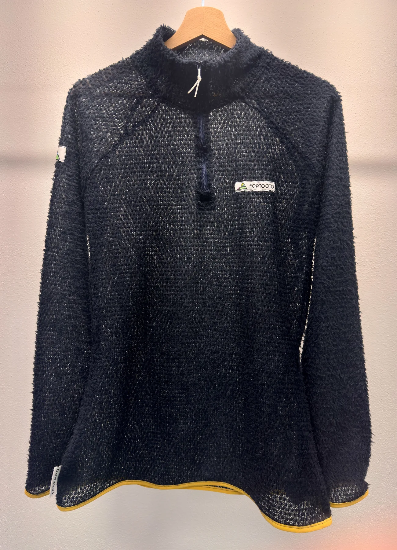 Front view of Sparks, a custom FORTOOTO Alpha 60 quarter zip pullover