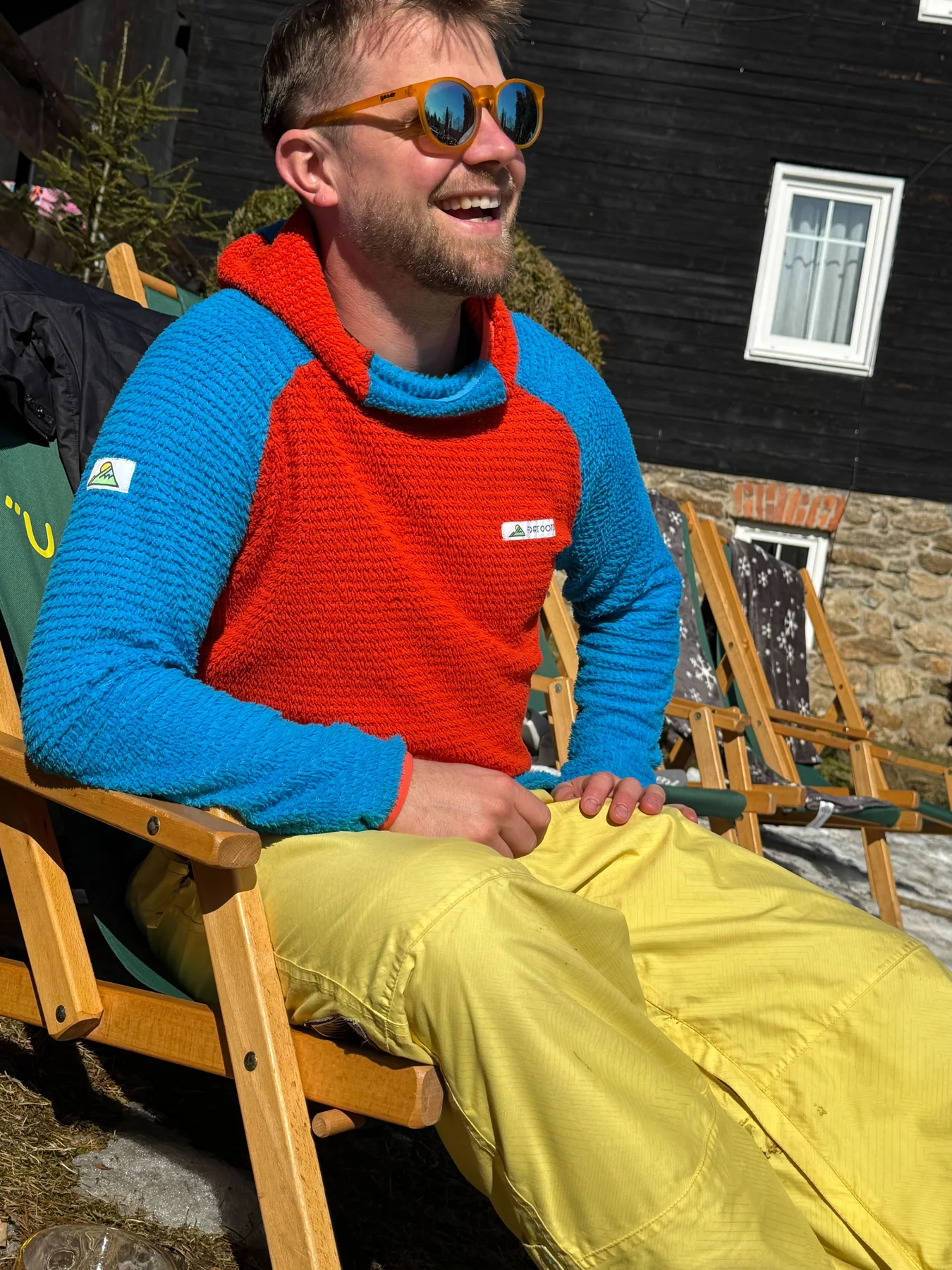 Person wearing a custom Alpha hoodie outdoors