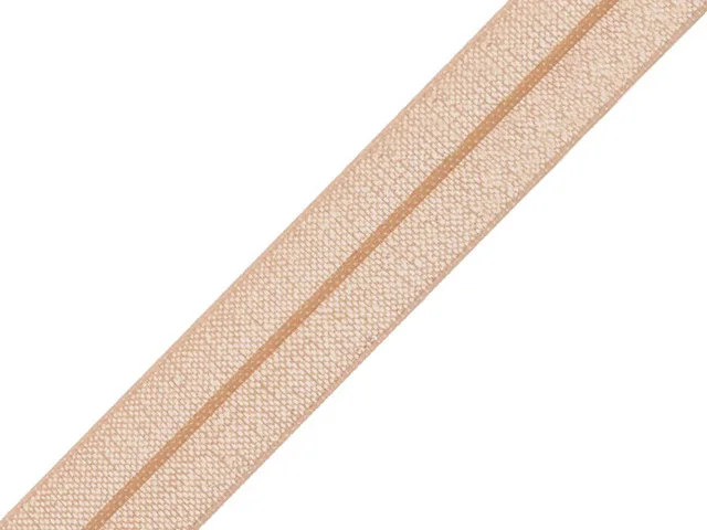 Nude fold-over elastic binding